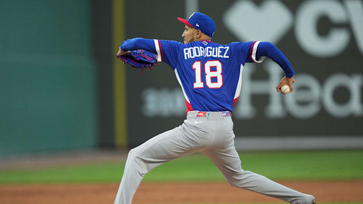 Mar 3, 2026; Lee County, FL, USA;  Puerto Rico pitcher Elmer Rodriguez (18) pitches in the first inning against the Boston Red Sox. Mandatory Credit: Jim Rassol-Imagn Images