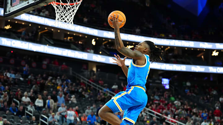 Mar 14, 2024; Las Vegas, NV, USA; UCLA Bruins guard Dylan Andrews (2) shoots against the Oregon Ducks during the second half at T-Mobile Arena. Mandatory Credit: Stephen R. Sylvanie-Imagn Images