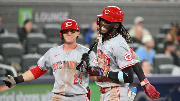 Cincinnati Reds shortstop Elly De La Cruz (44) is greeted at home plate by center fielder TJ Friedl (29) after hitting a solo home run against the Toronto Blue Jays in the eighth inning at Rogers Centre on Aug 21.