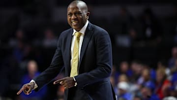Missouri Tigers head coach Dennis Gates laughs on the sidelines, in game versus the Florida Gators last season.