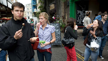 UK - Borough Market - Eating posh sausages