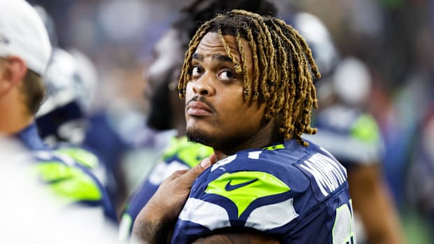 Seattle Seahawks defensive tackle Byron Murphy II stands on the sideline.