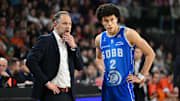 Feb 15, 2025 Caen, FRANCE; St Quentin point guard Nolan Traore with coach Julien Mahe against Le Mans in a Leaders Cup match.
