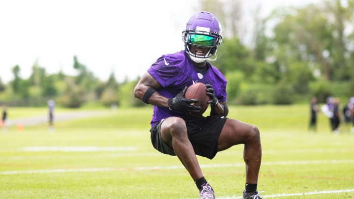 Brandon Powell catches a pass during Vikings organized team activities. 