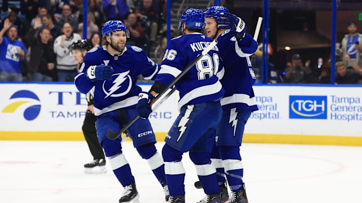 Feb 3, 2026; Tampa, Florida, USA; Tampa Bay Lightning right wing Nikita Kucherov (86) is congratulated by left wing Brandon Hagel (38) and center Jake Guentzel (59)  after he scored a goal against the Buffalo Sabres during the first period at Benchmark International Arena. Mandatory Credit: Kim Klement Neitzel-Imagn Images