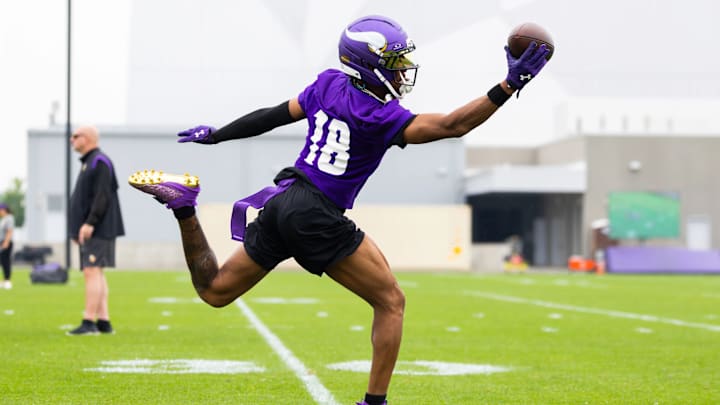 Justin Jefferson makes a one-handed catch at Vikings minicamp. Justin Jefferson makes a one-handed catch at Vikings minicamp.