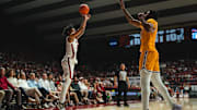 Dec 22, 2024; Tuscaloosa, Alabama, USA; Alabama Crimson Tide guard Houston Mallette (95) shoots from the three point line against Kent State Golden Flashes center Cli'Ron Hornbeak (42) during the second half at Coleman Coliseum. Mandatory Credit: Will McLelland-Imagn Images