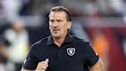 Aug 23, 2025; Glendale, Arizona, USA; Las Vegas Raiders quarterbacks coach Greg Olson against the Arizona Cardinals during a preseason NFL game at State Farm Stadium. Mandatory Credit: Mark J. Rebilas-Imagn Images
