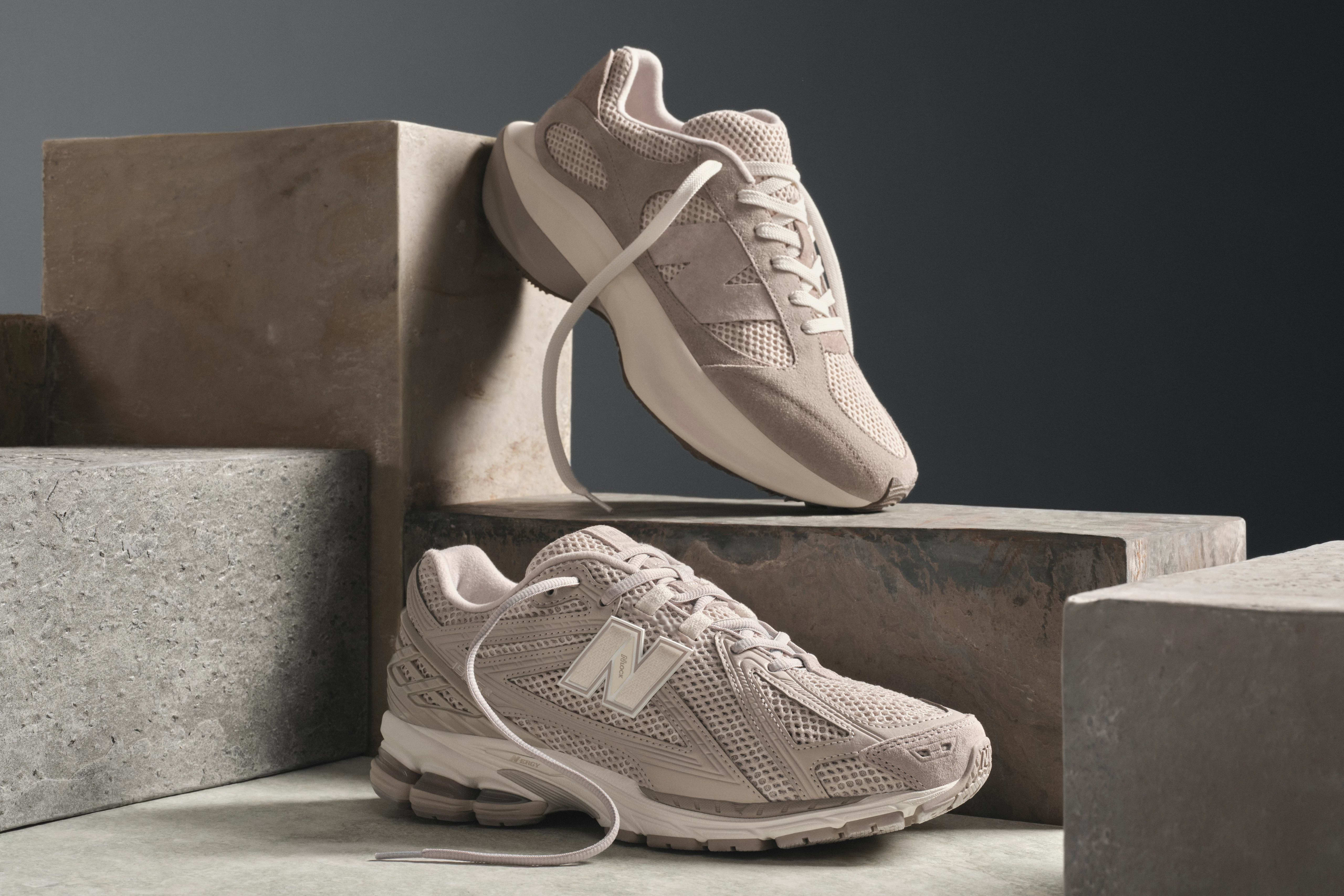 Side view of grey New Balance sneakers.