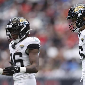 Nov 9, 2025; Houston, Texas, USA; Jacksonville Jaguars quarterback Trevor Lawrence (16) reacts after a play /during the game against the Houston Texans at NRG Stadium. Mandatory Credit: Troy Taormina-Imagn Images