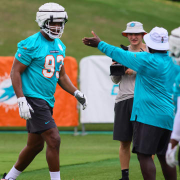 Miami Dolphins defensive tackle Calais Campbell (93) works out during training camp at Baptist Health Training Complex.