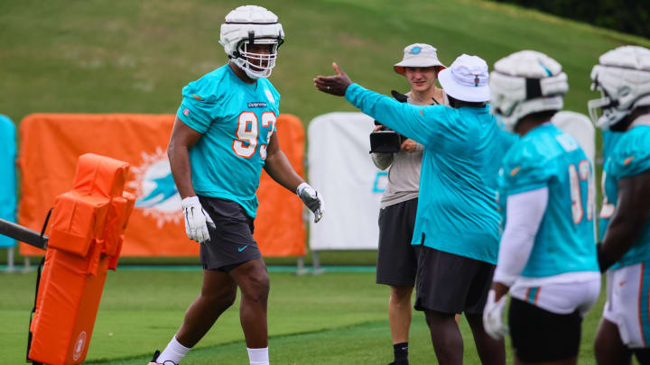 Miami Dolphins defensive tackle Calais Campbell (93) works out during training camp at Baptist Health Training Complex.