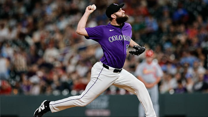 Jul 21, 2025; Denver, Colorado, USA; Colorado Rockies relief pitcher Jake Bird (59) pitches in the ninth inning against the St. Louis Cardinals at Coors Field.