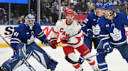 Feb 22, 2025; Toronto, Ontario, CAN;  Carolina Hurricanes forward Sebastian Aho (20) cuts in front of Toronto Maple Leafs goalie Anthony Stolarz (41) in the second period at Scotiabank Arena. Mandatory Credit: Dan Hamilton-Imagn Images
