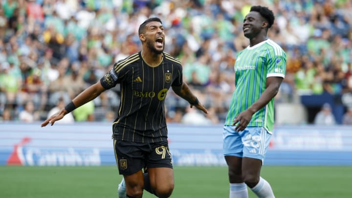 Aug 17, 2024; Seattle, Washington, USA; Seattle Sounders FC defender Yeimar Gómez (28) and Los Angeles FC forward Denis Bouanga (99) react after Bouanga’s made goal against the Seattle Sounders FC during the second half in a Leagues Cup quarterfinal match at Lumen Field. Mandatory Credit: Joe Nicholson-USA TODAY Sports