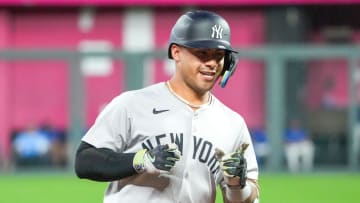 Jun 12, 2024; Kansas City, Missouri, USA; New York Yankees second baseman Gleyber Torres (25) celebrates while running the bases after hitting a three run home run against the Kansas City Royals in the seventh inning at Kauffman Stadium. Mandatory Credit: Denny Medley-USA TODAY Sports