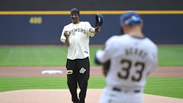 Jun 15, 2024; Milwaukee, Wisconsin, USA; Snoop Dog throws out the first pitch at the Cincinnati Reds and Milwaukee Brewers at American Family Field. Mandatory Credit: Michael McLoone-USA TODAY Sports
