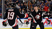 Jan 21, 2023; Buffalo, New York, USA;  Buffalo Sabres center Peyton Krebs (19) celebrates his goal with defenseman Rasmus Dahlin (26) during the second period against the Anaheim Ducks at KeyBank Center. Mandatory Credit: Timothy T. Ludwig-Imagn Images