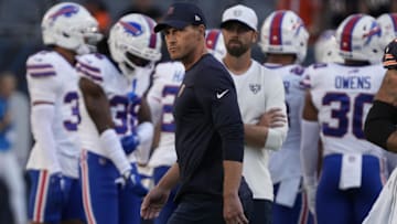 Chicago Bears head coach Ben Johnson on the field before a game against the Buffalo Bills at Soldier Field.