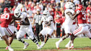 Nov 16, 2024; Fayetteville, Arkansas, USA; Texas Longhorns running back Quintrevion Wisner (26) rushes during the fourth quarter against the Arkansas Razorbacks at Donald W. Reynolds Razorback Stadium. Texas won 20-10. Mandatory Credit: Nelson Chenault-Imagn Images