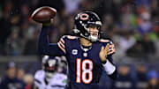 Dec 26, 2024; Chicago, Illinois, USA; Chicago Bears quarterback Caleb Williams (18) passes the ball against the Seattle Seahawks during the first quarter at Soldier Field. Mandatory Credit: Daniel Bartel-Imagn Images