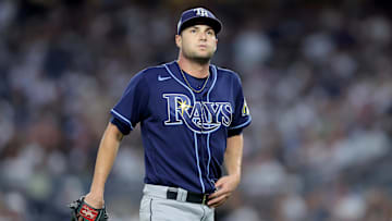 Aug 2, 2023; Bronx, New York, USA; Tampa Bay Rays starting pitcher Shane McClanahan (18) reacts during the fourth inning against the New York Yankees at Yankee Stadium. Mandatory Credit: Brad Penner-Imagn Images
