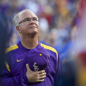 Jun 26, 2017; Omaha, NE, USA;  LSU Tigers head coach Paul Mainieri watches the military flyover during the National Anthem prior to the game agianst  the Florida Gatorsin game one of the championship series of the 2017 College World Series at TD Ameritrade Park Omaha. Mandatory Credit: Bruce Thorson-USA TODAY Sports