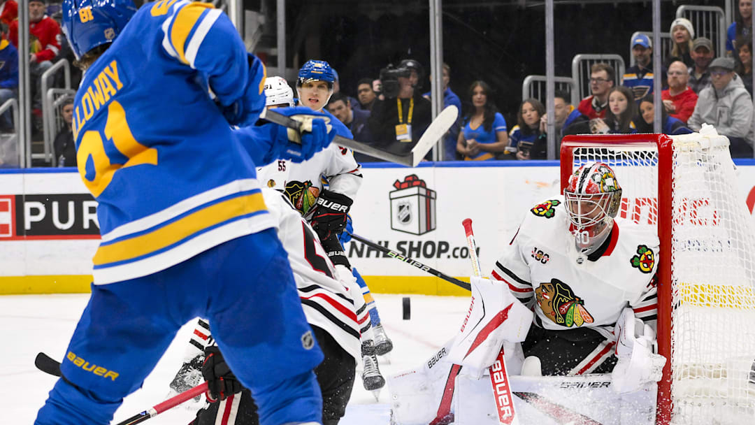 Dec 12, 2025; St. Louis, Missouri, USA; Chicago Blackhawks goaltender Spencer Knight (30) defends the net against St. Louis Blues left wing Dylan Holloway (81) during the second period at Enterprise Center. Mandatory Credit: Jeff Curry-Imagn Images Dec 12, 2025; St. Louis, Missouri, USA; Chicago Blackhawks goaltender Spencer Knight (30) defends the net against St. Louis Blues left wing Dylan Holloway (81) during the second period at Enterprise Center. Mandatory Credit: Jeff Curry-Imagn Images