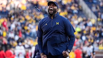 Michigan head coach Sherrone Moore fires up the student section during warm-up ahead of the New Mexico game at Michigan Stadium in Ann Arbor on Saturday, August 30, 2025.