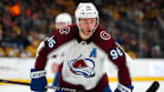 Apr 14, 2024; Las Vegas, Nevada, USA; Colorado Avalanche right wing Mikko Rantanen (96) talks to a team mate before a face off against the Vegas Golden Knights during the second period at T-Mobile Arena. Mandatory Credit: Stephen R. Sylvanie-Imagn Images