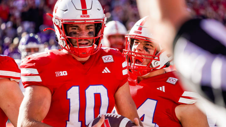 Oct 21, 2023; Lincoln, Nebraska, USA; Nebraska Cornhuskers quarterback Heinrich Haarberg (10) and tight end Luke Lindenmeyer (44) celebrate after a touchdown by Haarberg against the Northwestern Wildcats during the second quarter at Memorial Stadium.