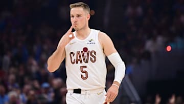 Mar 30, 2025; Cleveland, Ohio, USA; Cleveland Cavaliers guard Sam Merrill (5) celebrates after hitting a three point basket during the first half against the Los Angeles Clippers at Rocket Arena. Mandatory Credit: Ken Blaze-Imagn Images