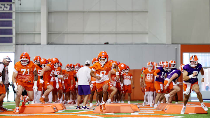 Clemson players doing step over bag agility drills during 2025 Clemson Football Camp