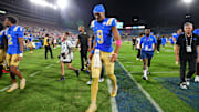 UCLA Bruins quarterback Nico Iamaleava (9) leaves the field following the loss aganst the Utah Utes at Rose Bowl. Mandatory Credit: Gary A. Vasquez-Imagn Images