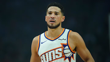 Nov 18, 2025; Portland, Oregon, USA; Phoenix Suns guard Devin Booker (1) looks on during the first half against the Portland Trail Blazers at Moda Center. Mandatory Credit: Soobum Im-Imagn Images