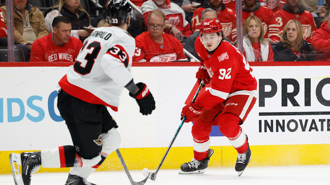 Mar 24, 2026; Detroit, Michigan, USA; Detroit Red Wings center Marco Kasper (92) skates with the puck defended by Ottawa Senators defenseman Nikolas Matinpalo (33) in the second period at Little Caesars Arena. Mandatory Credit: Rick Osentoski-Imagn Images Mar 24, 2026; Detroit, Michigan, USA; Detroit Red Wings center Marco Kasper (92) skates with the puck defended by Ottawa Senators defenseman Nikolas Matinpalo (33) in the second period at Little Caesars Arena. Mandatory Credit: Rick Osentoski-Imagn Images