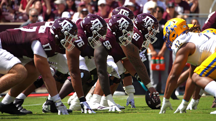 Sep 7, 2024; College Station, Texas, USA; Texas A&M Aggies offensive linemen start a play against the McNeese State Cowboys during the first quarter at Kyle Field.