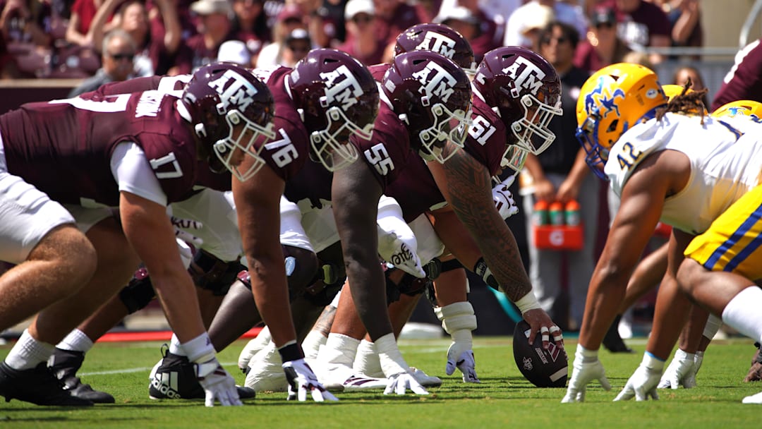 Texas A&M Aggies offensive linemen line up before a play against the McNeese State Cowboys during the first quarter at Kyle Field.
