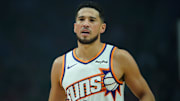Nov 18, 2025; Portland, Oregon, USA; Phoenix Suns guard Devin Booker (1) looks on during the first half against the Portland Trail Blazers at Moda Center. Mandatory Credit: Soobum Im-Imagn Images
