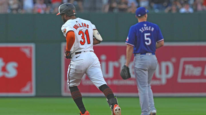 Jun 27, 2024; Baltimore, Maryland, USA; Baltimore Orioles outfielder Cedric Mullins (31) rounds the bases following his two-run home run in the fourth inning against the Texas Rangers at Oriole Park at Camden Yards. Mandatory Credit: Mitch Stringer-USA TODAY Sports