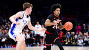 Louisville point guard Chucky Hepburn (24)