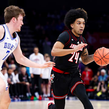 Louisville point guard Chucky Hepburn (24)