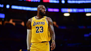 Mar 6, 2025; Los Angeles, California, USA; Los Angeles Lakers forward LeBron James (23) against the New York Knicks during the second half at Crypto.com Arena. Mandatory Credit: Gary A. Vasquez-Imagn Images