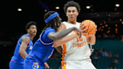 Nov 26, 2025; Las Vegas, NV, USA; Tennessee Volunteers forward Nate Ament (10) drives against Tennessee Volunteers guard Gavin Paull (11) in the first half in the 2025 Players Era Festival third place game at MGM Grand Garden Arena. Mandatory Credit: Kirby Lee-Imagn Images