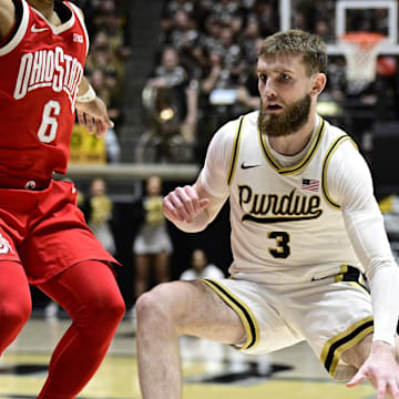 Jan 21, 2025; West Lafayette, Indiana, USA; Purdue Boilermakers guard Braden Smith (3) finds Ohio State Buckeyes guard Ques Glover (6) while running down court during the second half at Mackey Arena. Mandatory Credit: Marc Lebryk-Imagn Images