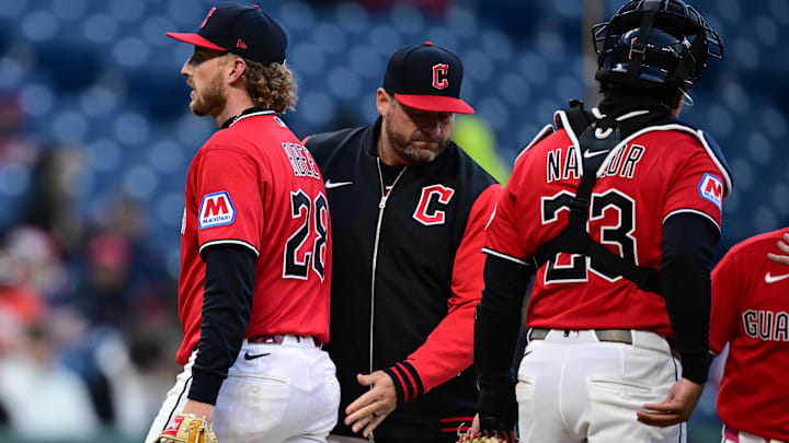 Apr 6, 2026: Cleveland Guardians starting pitcher Tanner Bibee (28) is removed from the game by Manager Stephen Vogt (12) during the fifth inning against the Kansas City Royals at Progressive Field. 
