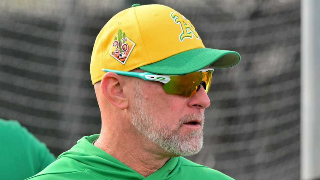 Feb 11, 2026; Mesa, AZ, USA; Athletics manager Mark Kotsay (7) looks on during a Spring Training workout at HoHhokum stadium. Mandatory Credit: Matt Kartozian-Imagn Images Feb 11, 2026; Mesa, AZ, USA; Athletics manager Mark Kotsay (7) looks on during a Spring Training workout at HoHhokum stadium. Mandatory Credit: Matt Kartozian-Imagn Images