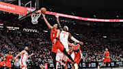 Jan 18, 2025; Portland, Oregon, USA;  Portland Trail Blazers forward Delano Banton (5) shoots over Houston Rockets guard Aaron Holiday (0) during the second half at Moda Center. Mandatory Credit: Brian Murphy-Imagn Images