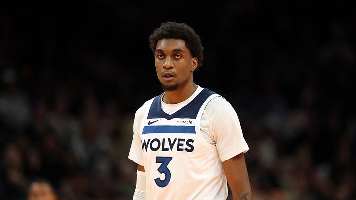 Nov 21, 2025; Phoenix, Arizona, USA; Minnesota Timberwolves forward Jaden McDaniels (3) against the Phoenix Suns during an NBA Cup game at Mortgage Matchup Center. Mandatory Credit: Mark J. Rebilas-Imagn Images