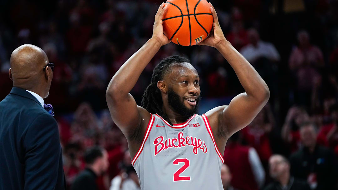 Ohio State Buckeyes guard Bruce Thornton (2) celebrates with Dennis Hopson after becoming Ohio State men's basketball's all-time leading scorer in the first half of the NCAA game at Value City Arena on Saturday, March 7, 2026 in Columbus, Ohio. Ohio State Buckeyes guard Bruce Thornton (2) celebrates with Dennis Hopson after becoming Ohio State men's basketball's all-time leading scorer in the first half of the NCAA game at Value City Arena on Saturday, March 7, 2026 in Columbus, Ohio.